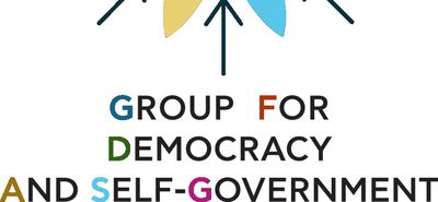 To λογότυπο του "Ομίλου για την Δημοκρατία και την Αυτοδιοίκηση"